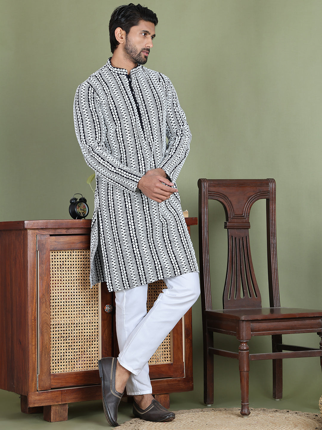 Embroidered And Mirror Work Kurta Pyjama Sets.