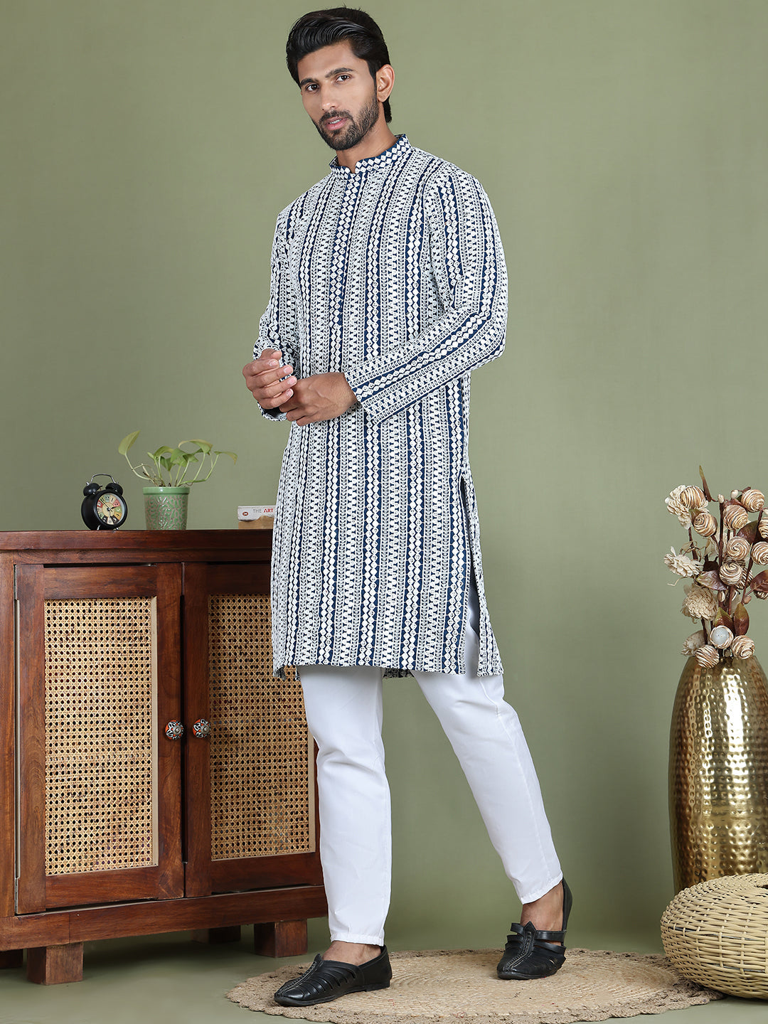 Embroidered And Mirror Work Kurta Pyjama Sets.