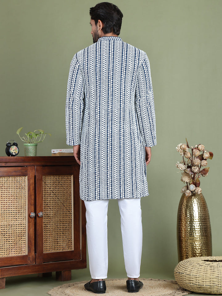 Embroidered And Mirror Work Kurta Pyjama Sets.