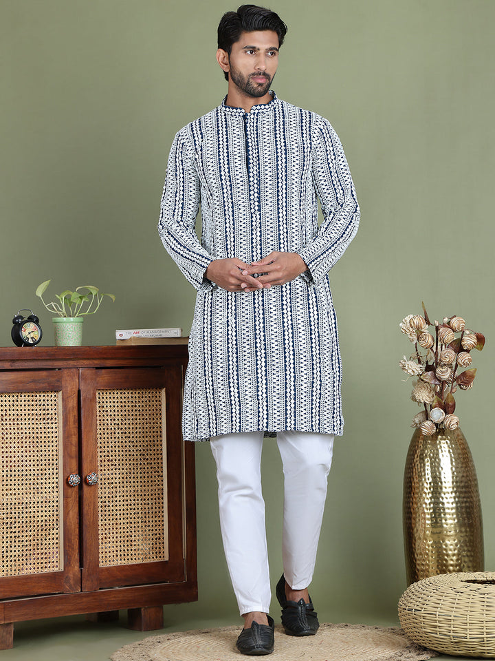 Embroidered And Mirror Work Kurta Pyjama Sets.