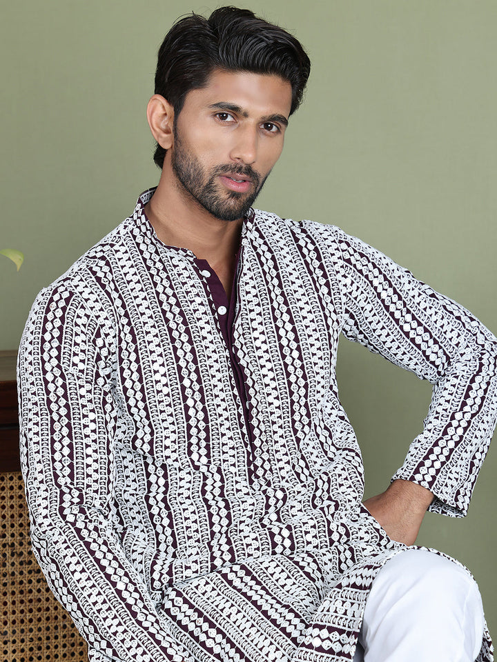 Embroidered And Mirror Work Kurta Pyjama Sets.
