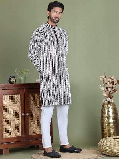 Embroidered And Mirror Work Kurta Pyjama Sets.