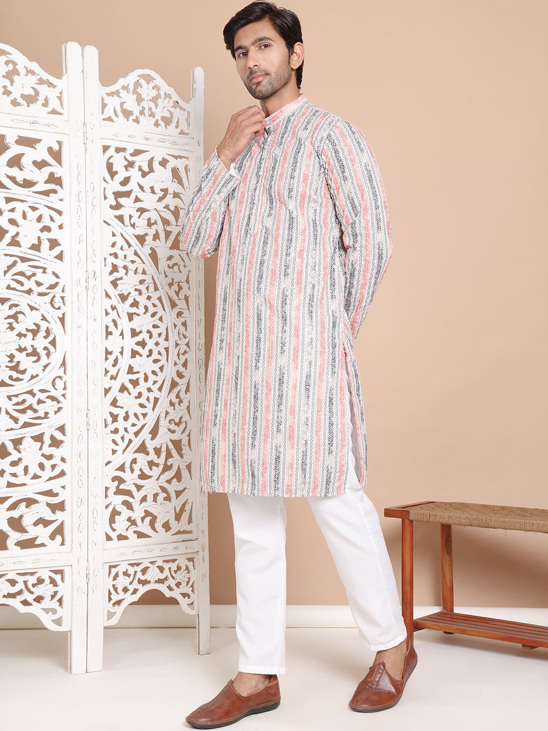 Printed And Embroidered Kurta Pyjama Set.