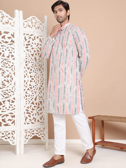Printed And Embroidered Kurta Pyjama Set.