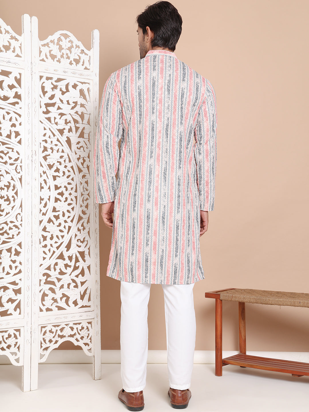 Printed And Embroidered Kurta Pyjama Set.
