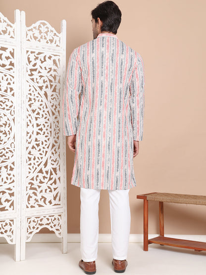 Printed And Embroidered Kurta Pyjama Set.