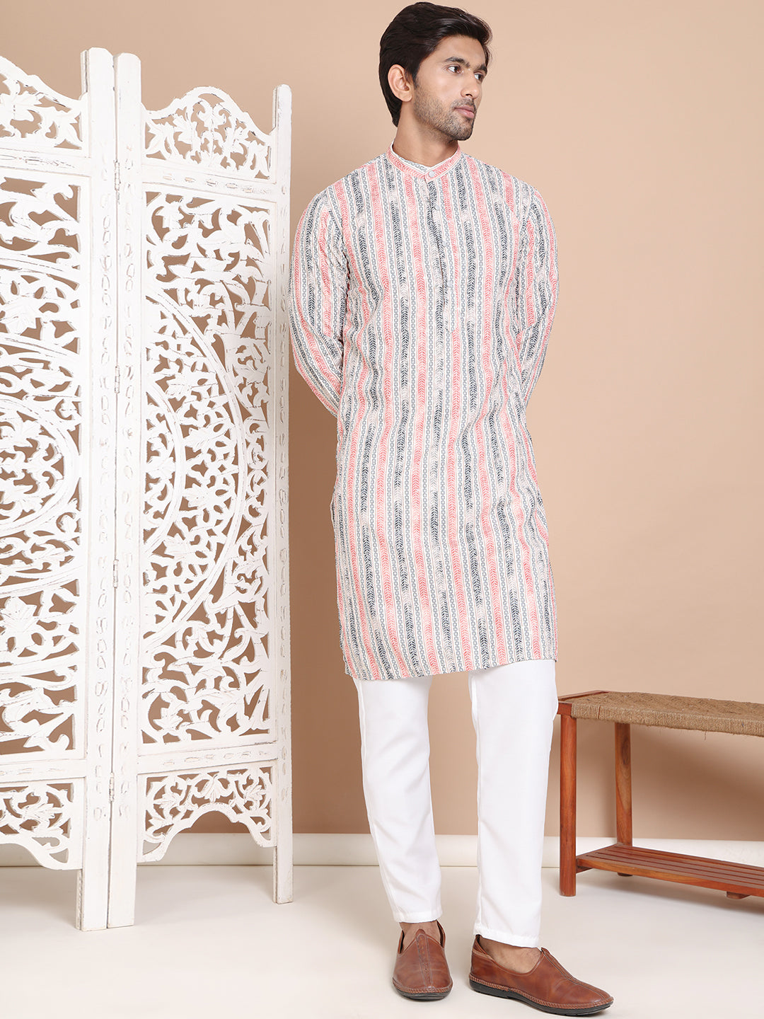 Printed And Embroidered Kurta Pyjama Set.