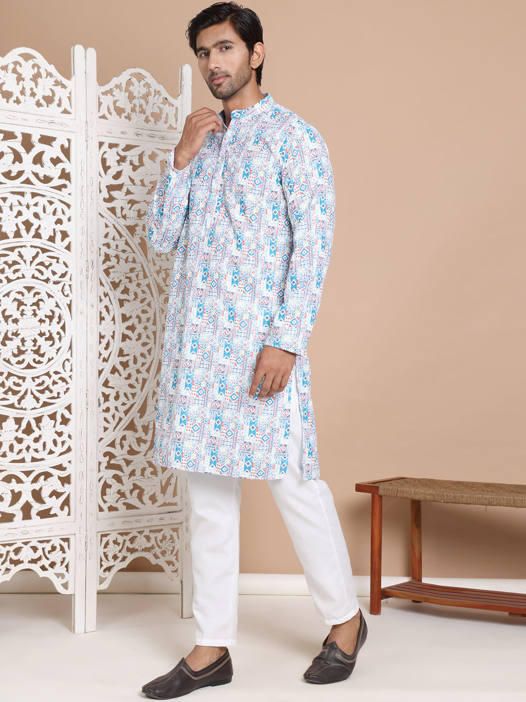 Printed And Embroidered Kurta Pyjama Set.