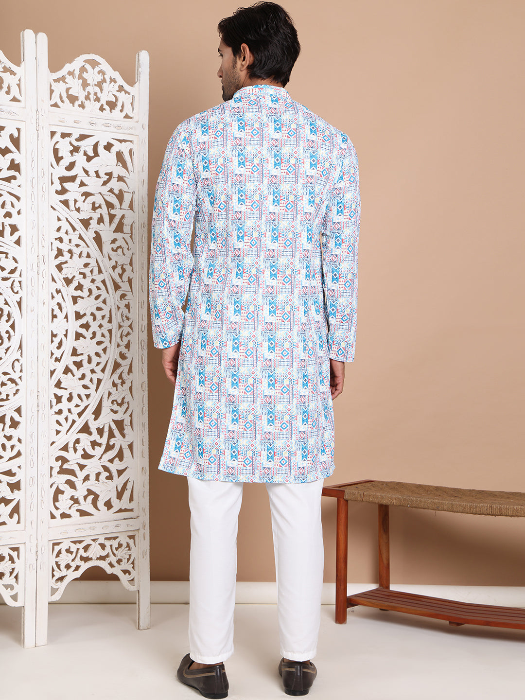 Printed And Embroidered Kurta Pyjama Set.