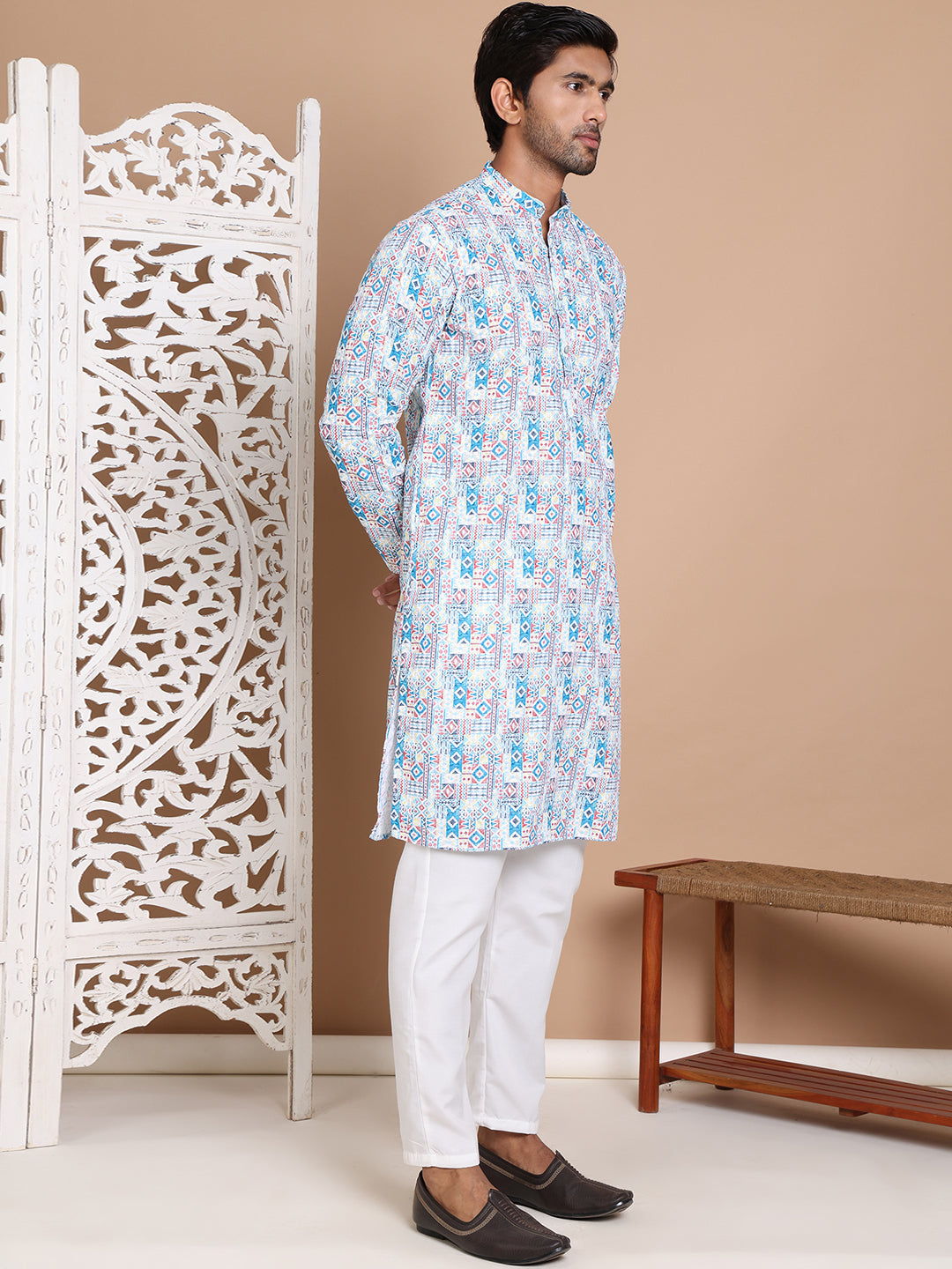 Printed And Embroidered Kurta Pyjama Set.