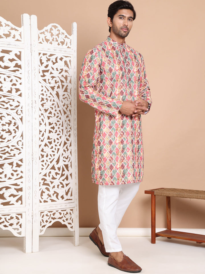 Printed And Embroidered Kurta Pyjama Set.