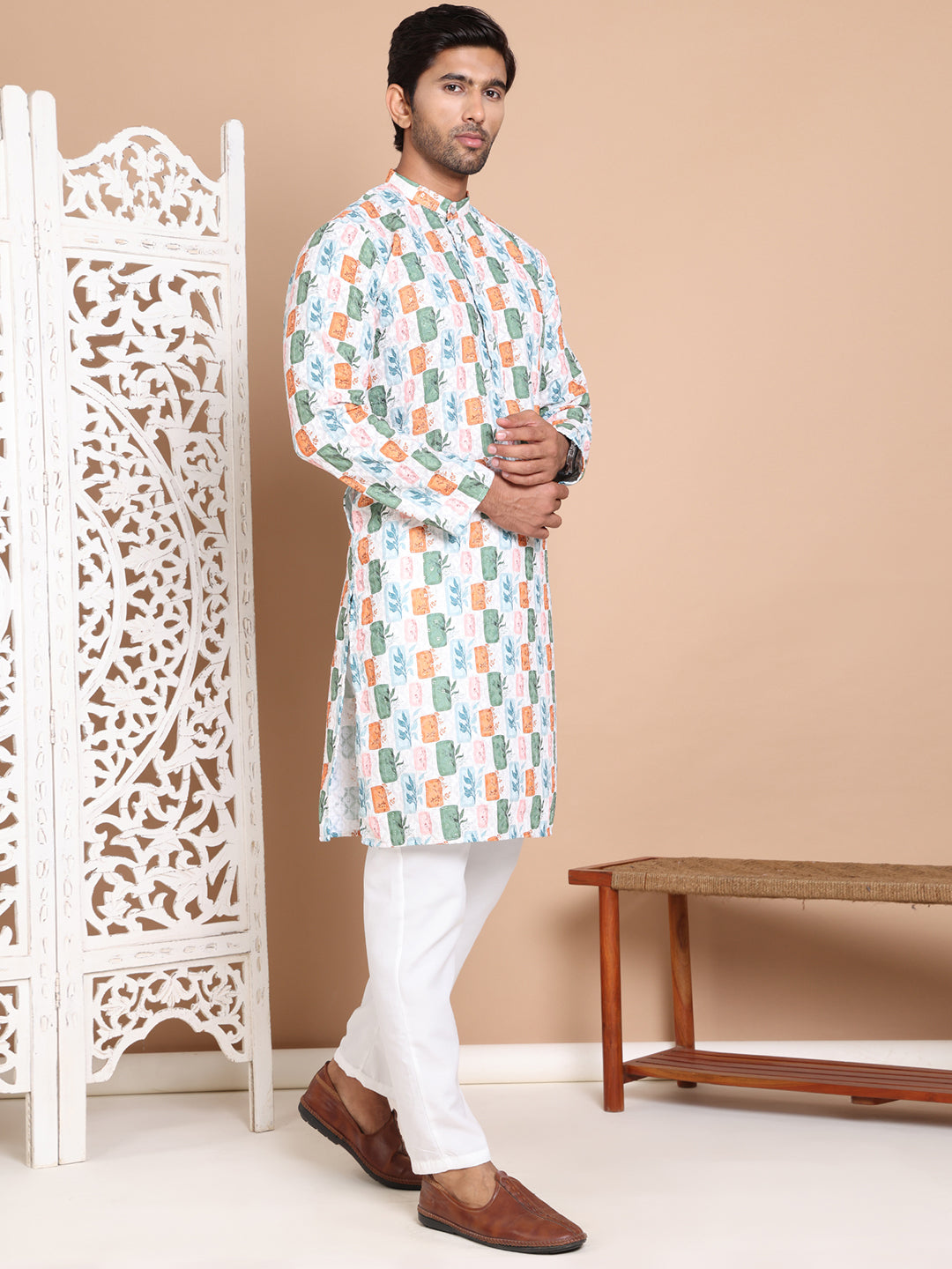 Printed And Embroidered Kurta Pyjama Set.