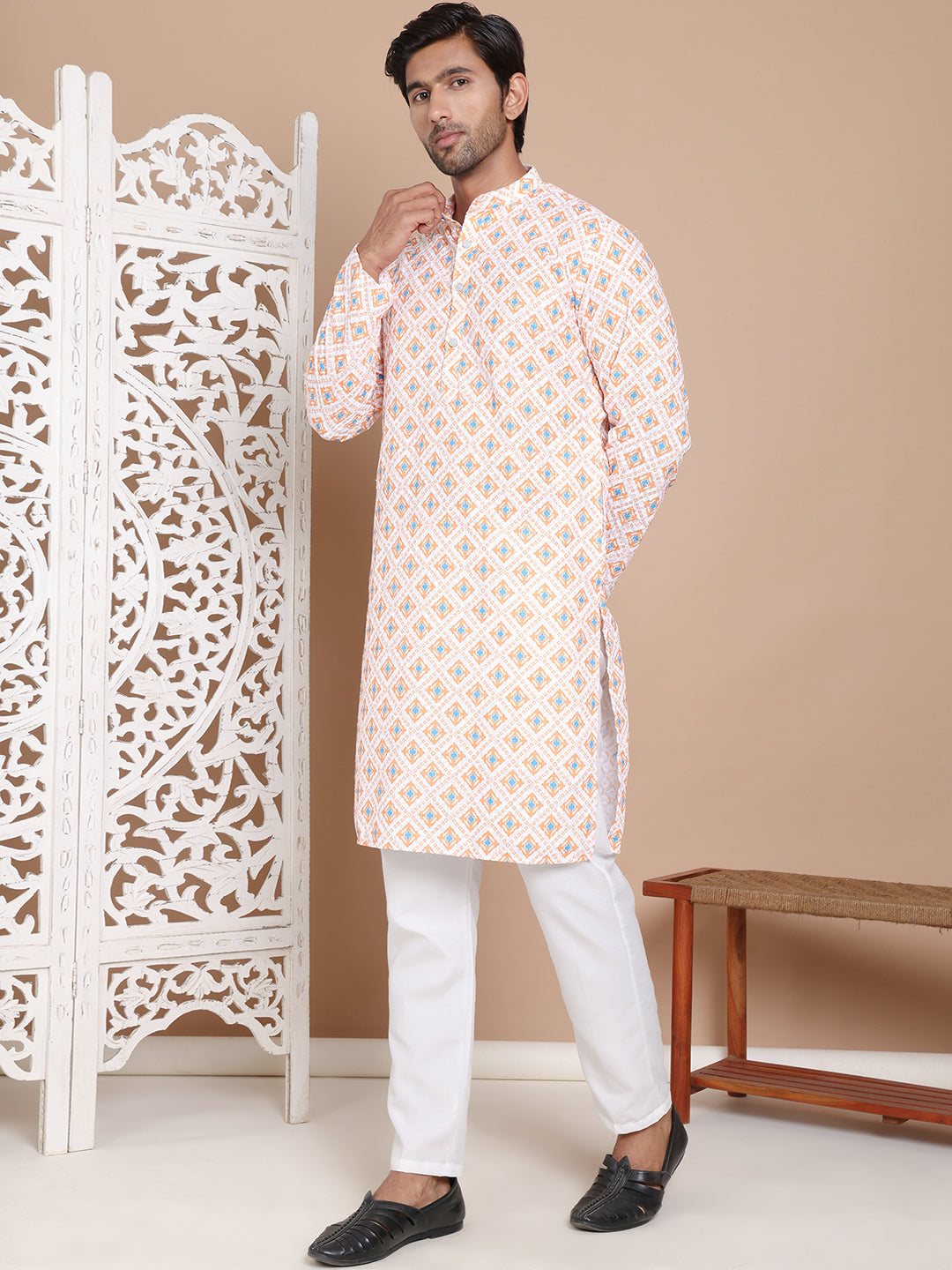 Printed And Embroidered Kurta Pyjama Set.