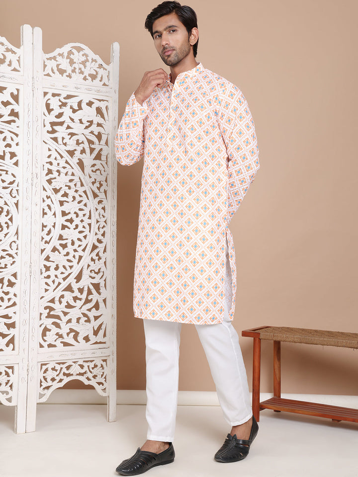 Printed And Embroidered Kurta Pyjama Set.
