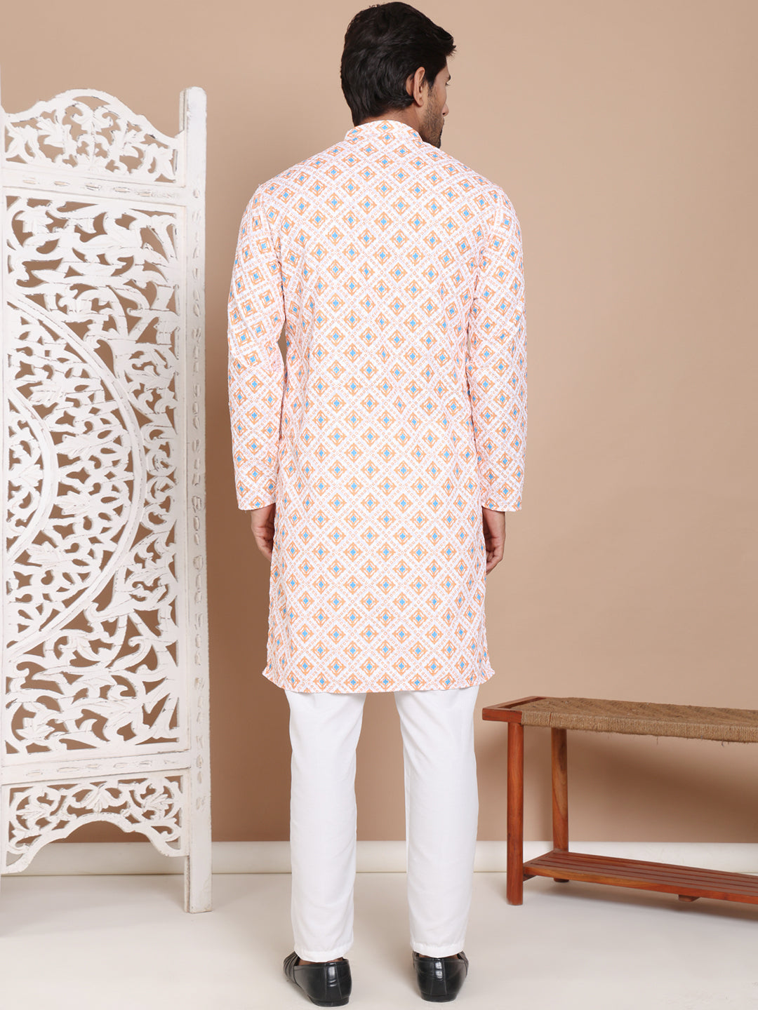 Printed And Embroidered Kurta Pyjama Set.