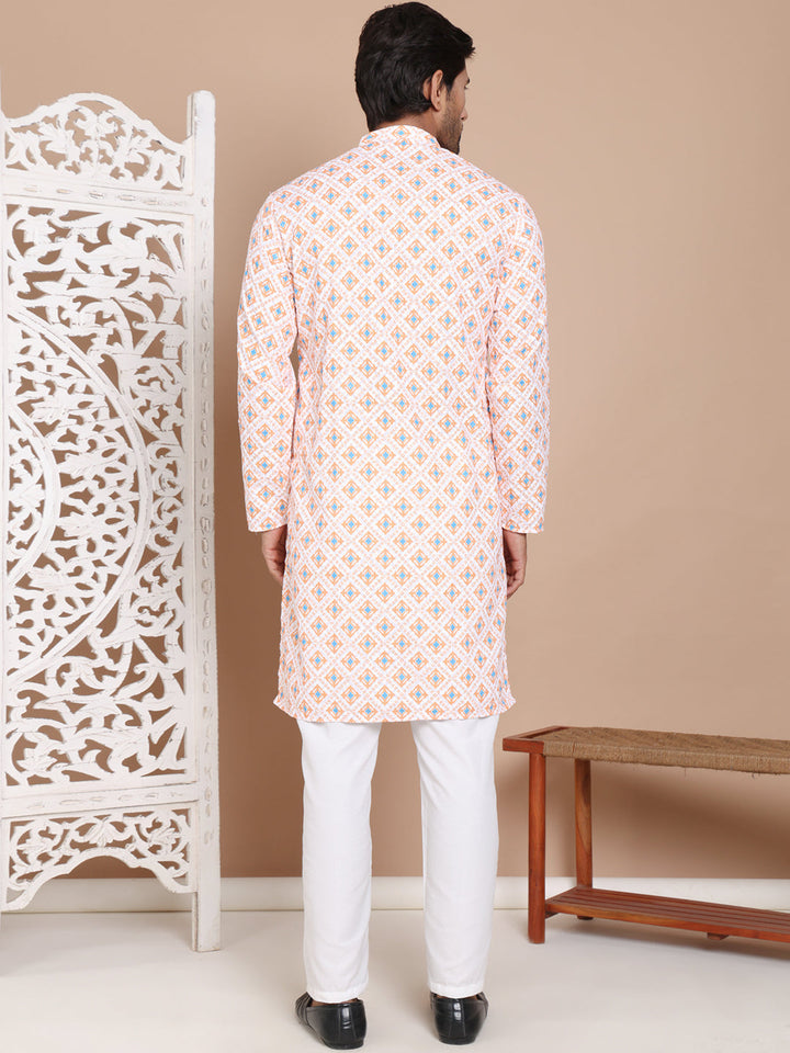 Printed And Embroidered Kurta Pyjama Set.