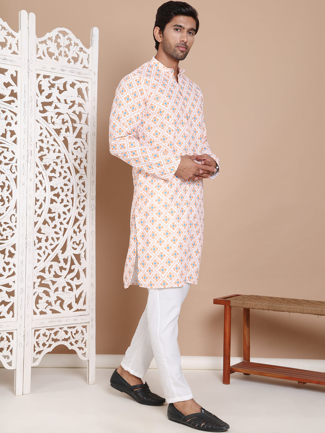 Printed And Embroidered Kurta Pyjama Set.