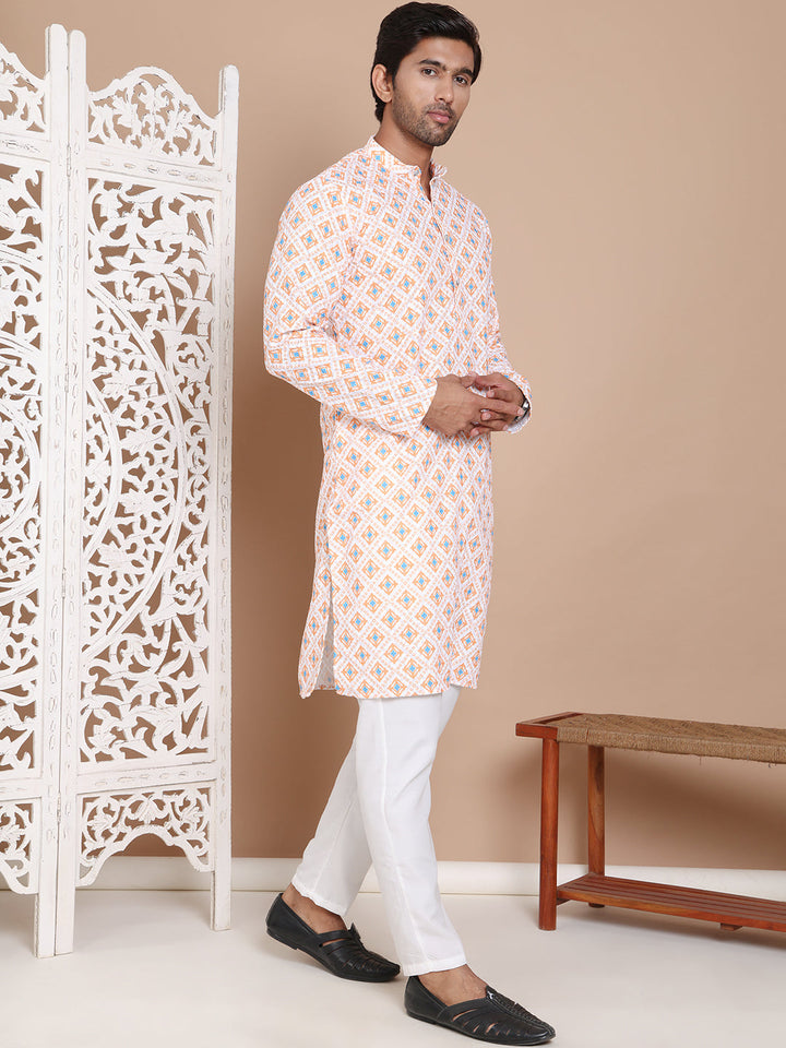 Printed And Embroidered Kurta Pyjama Set.