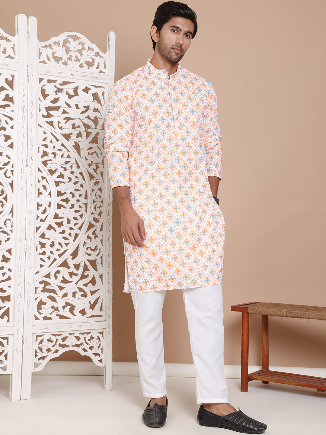 Printed And Embroidered Kurta Pyjama Set.