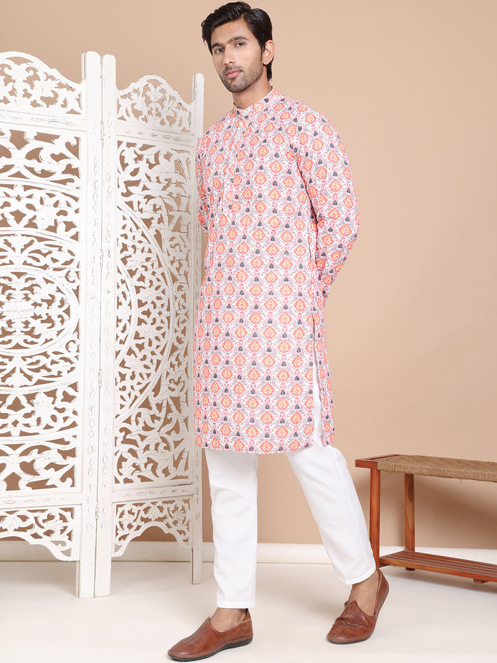 Printed And Embroidered Kurta Pyjama Set.