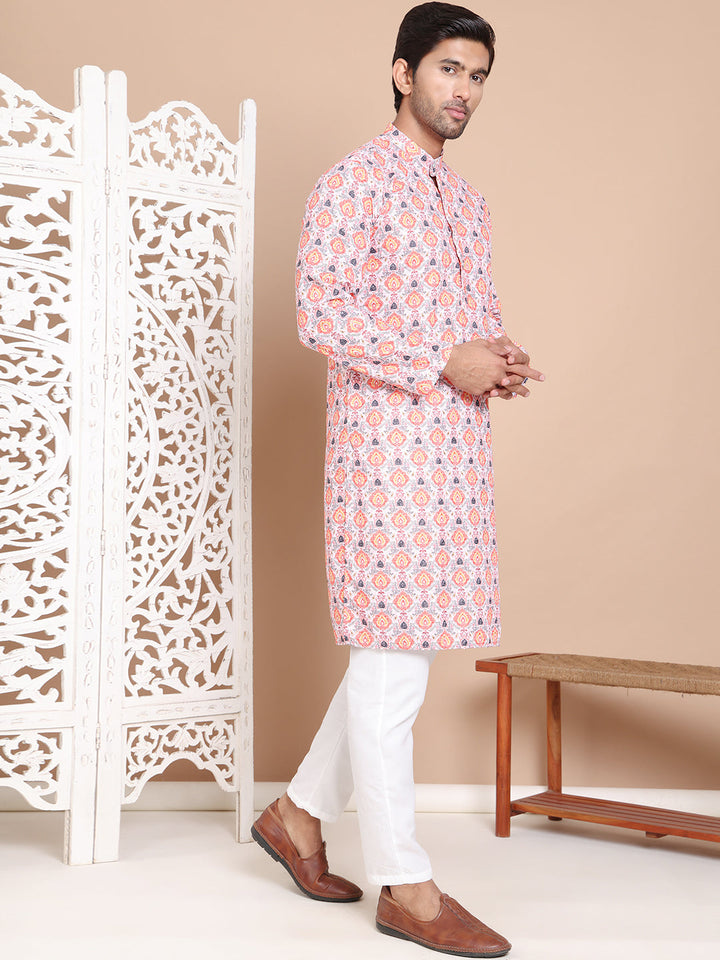 Printed And Embroidered Kurta Pyjama Set.