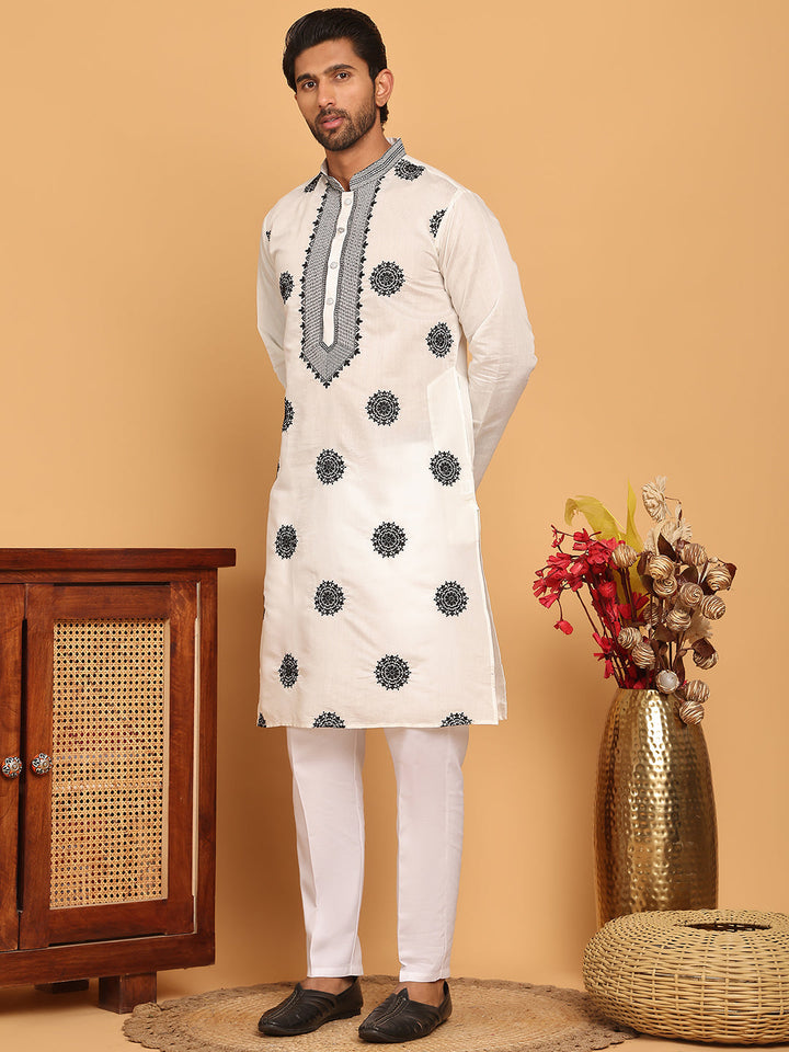 White Embroidered And Sequins Kurta Pyjama Set.