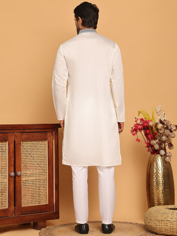 White Embroidered And Sequins Kurta Pyjama Set.