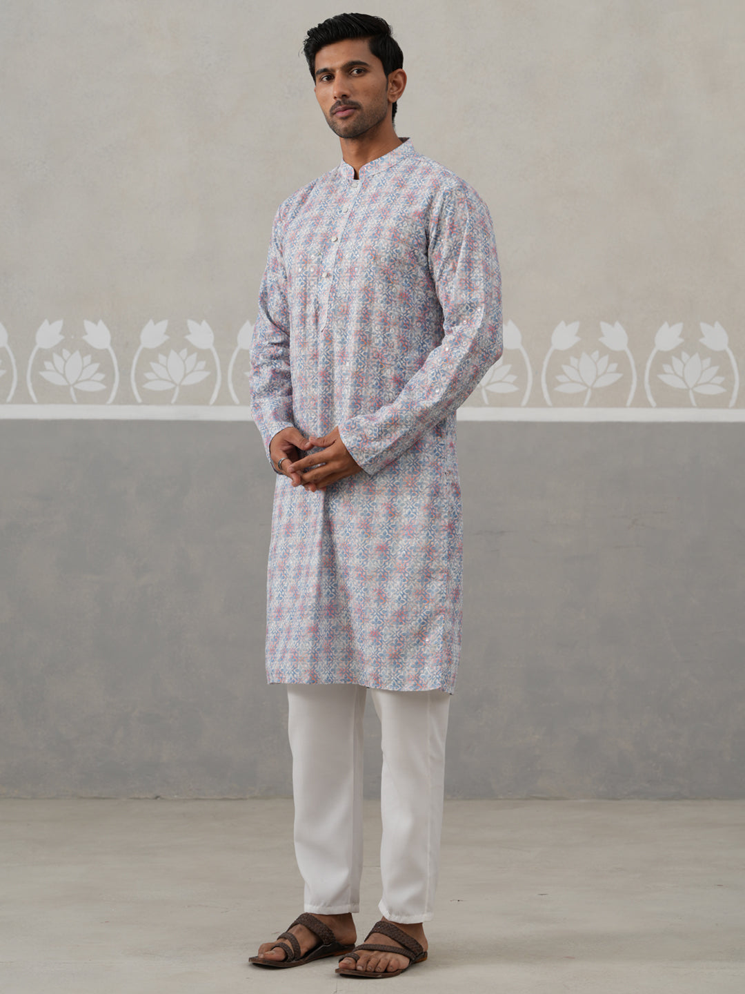 Printed And Embroidered Kurta Pyjama Set.