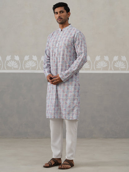 Printed And Embroidered Kurta Pyjama Set.