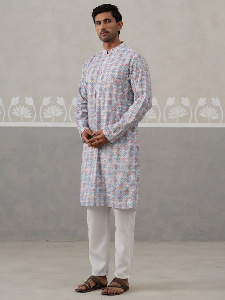 Printed And Embroidered Kurta Pyjama Set.