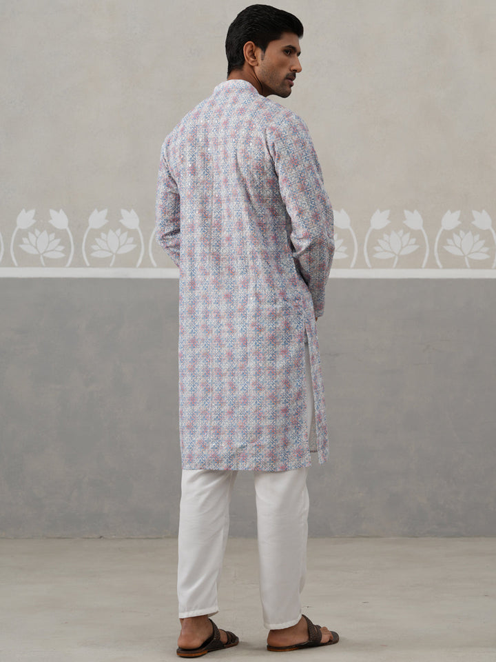 Printed And Embroidered Kurta Pyjama Set.