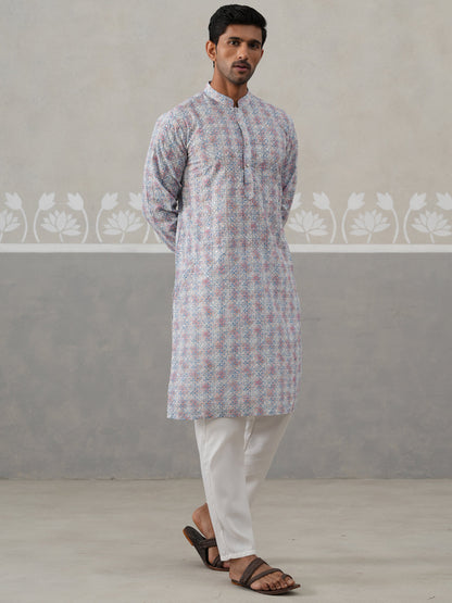 Printed And Embroidered Kurta Pyjama Set.