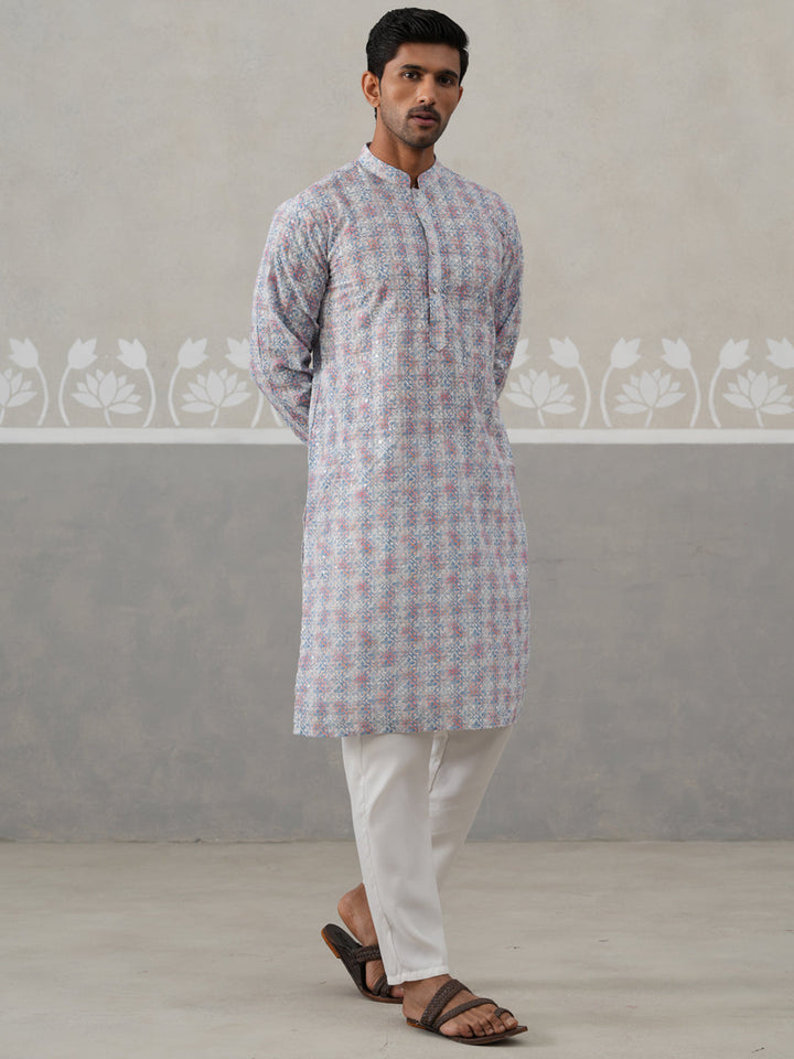 Printed And Embroidered Kurta Pyjama Set.