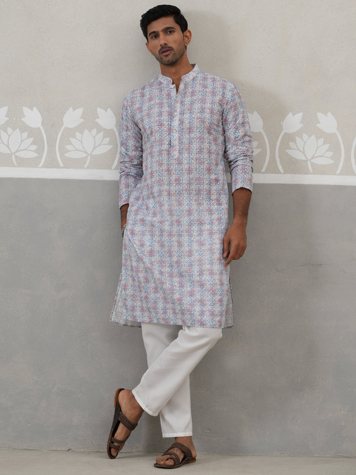 Printed And Embroidered Kurta Pyjama Set.
