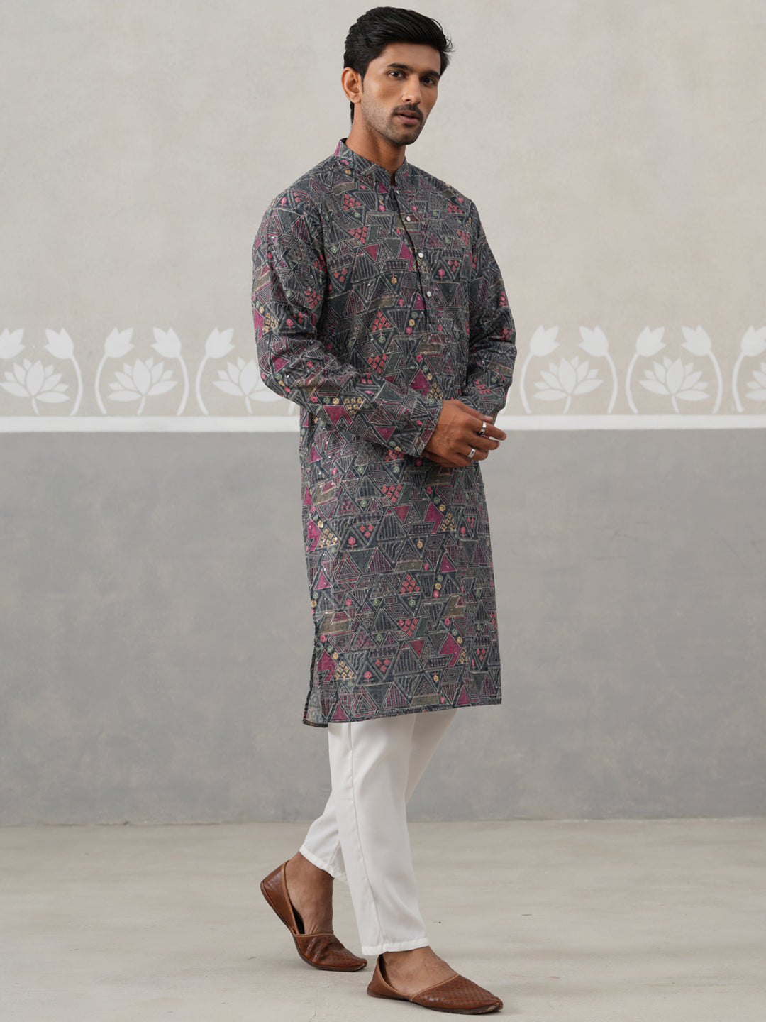 Printed And Embroidered Kurta Pyjama Set.