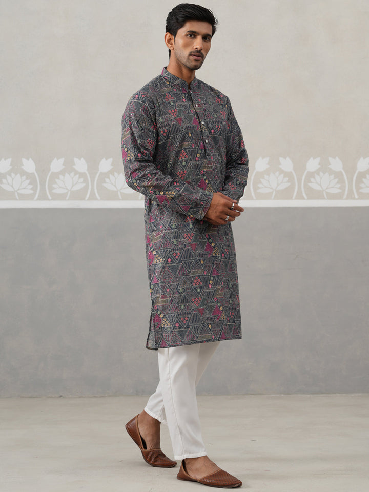 Printed And Embroidered Kurta Pyjama Set.