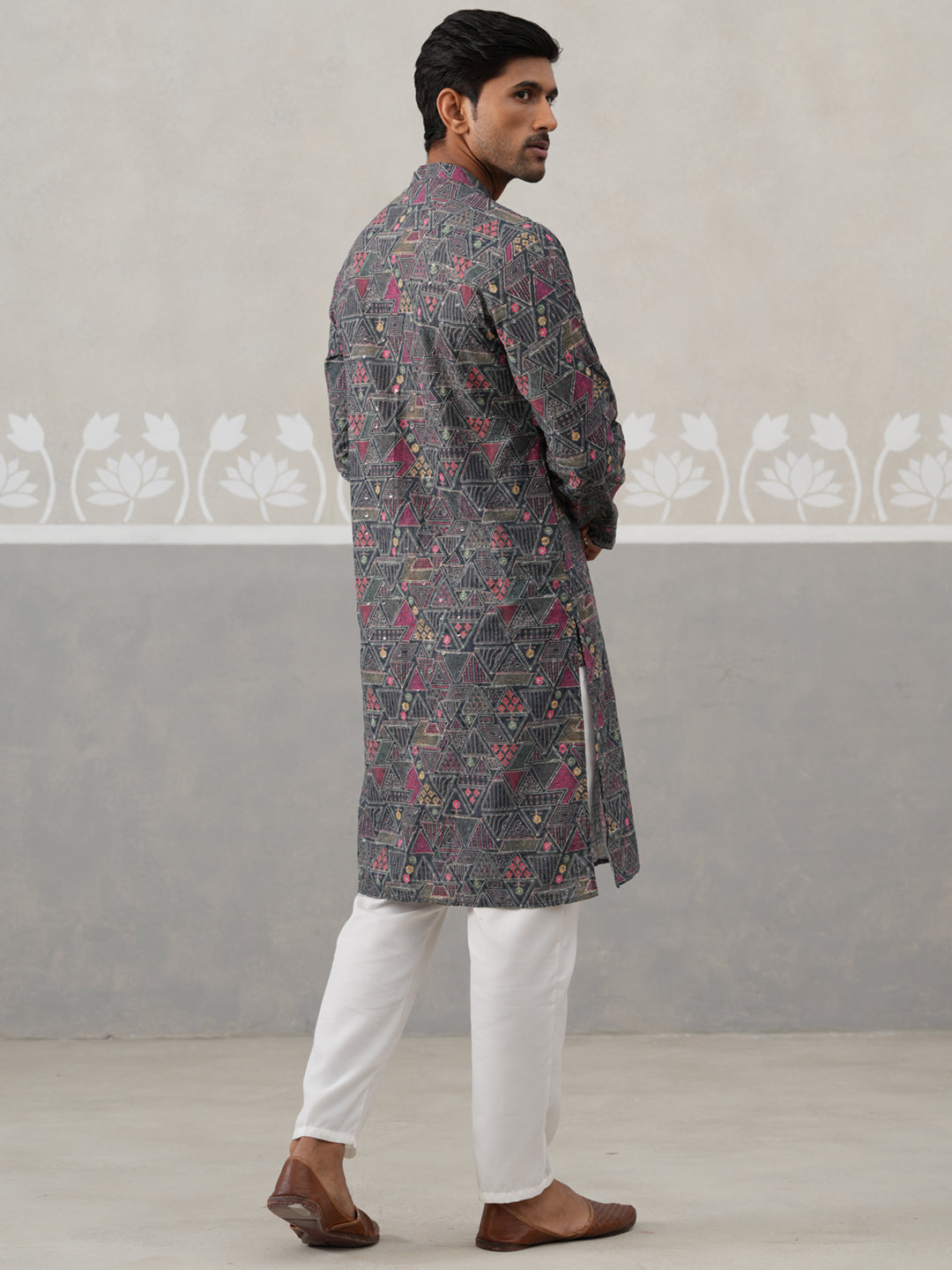 Printed And Embroidered Kurta Pyjama Set.