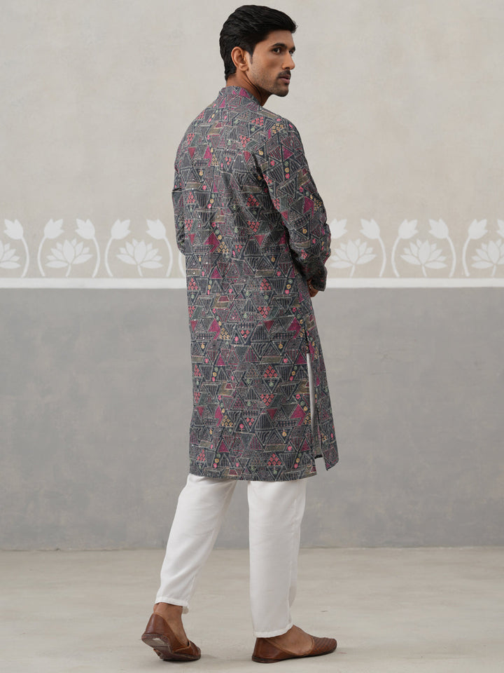 Printed And Embroidered Kurta Pyjama Set.