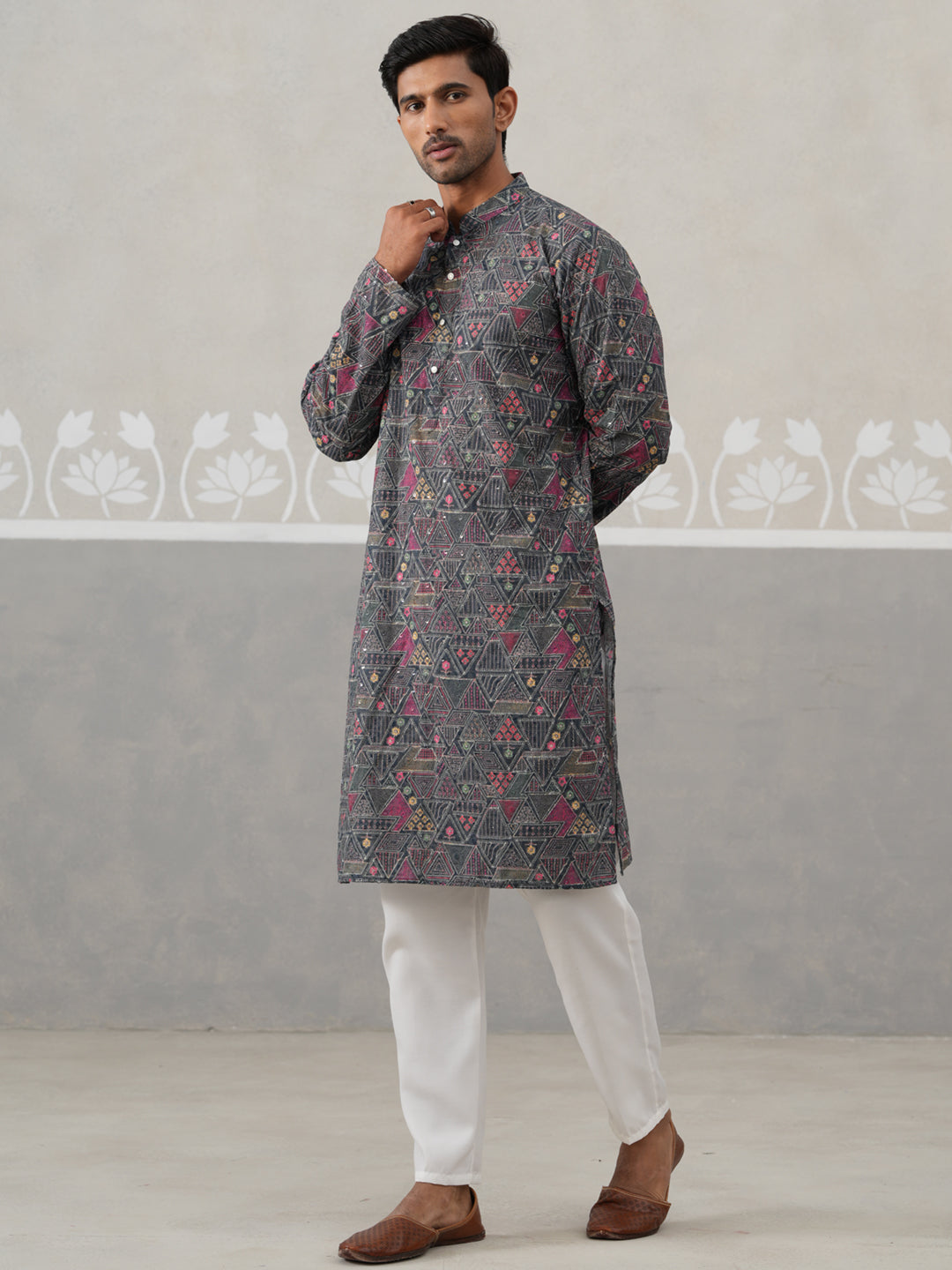 Printed And Embroidered Kurta Pyjama Set.