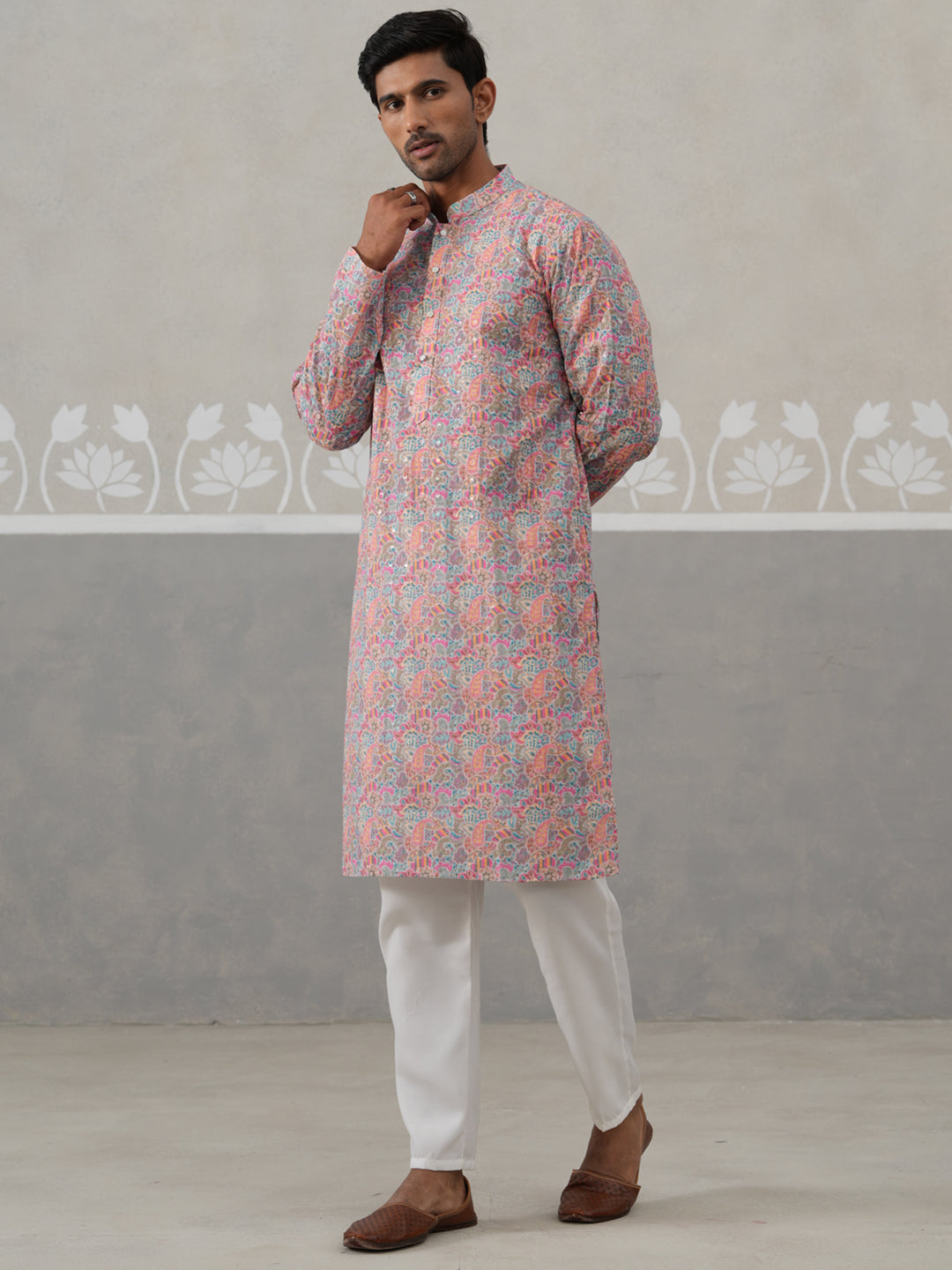 Printed And Embroidered Kurta Pyjama Set.