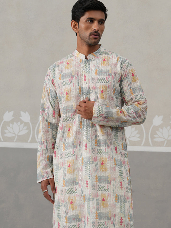 Printed And Embroidered Kurta Pyjama Set.