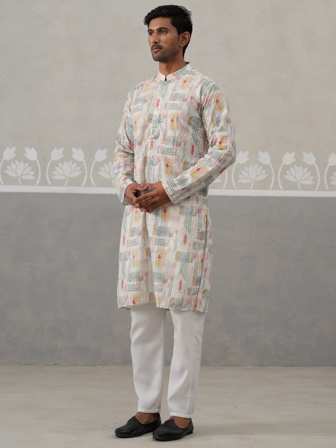 Printed And Embroidered Kurta Pyjama Set.