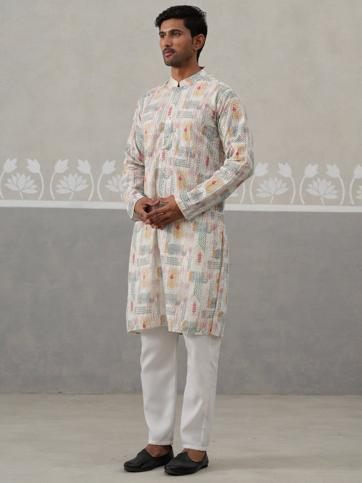 Printed And Embroidered Kurta Pyjama Set.