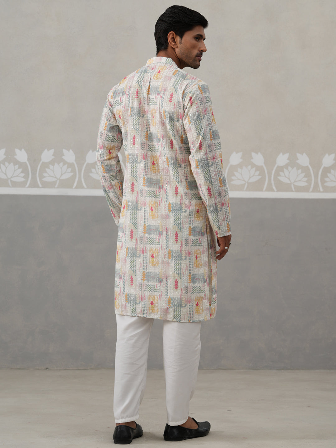 Printed And Embroidered Kurta Pyjama Set.