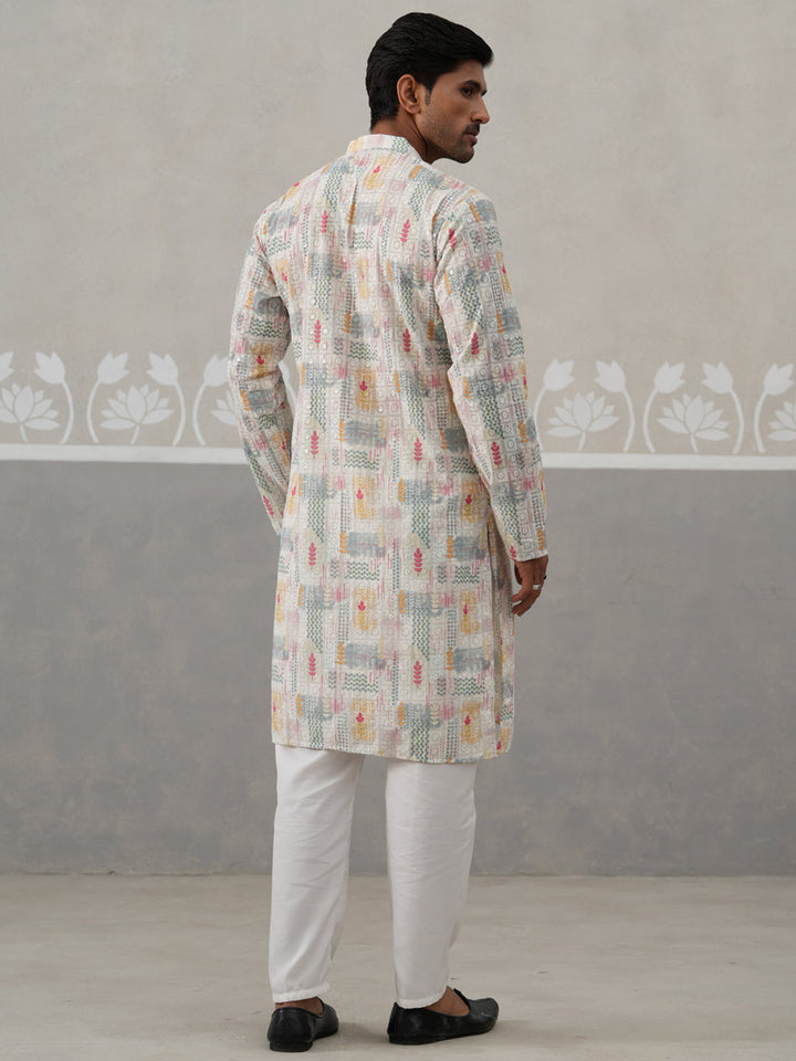 Printed And Embroidered Kurta Pyjama Set.
