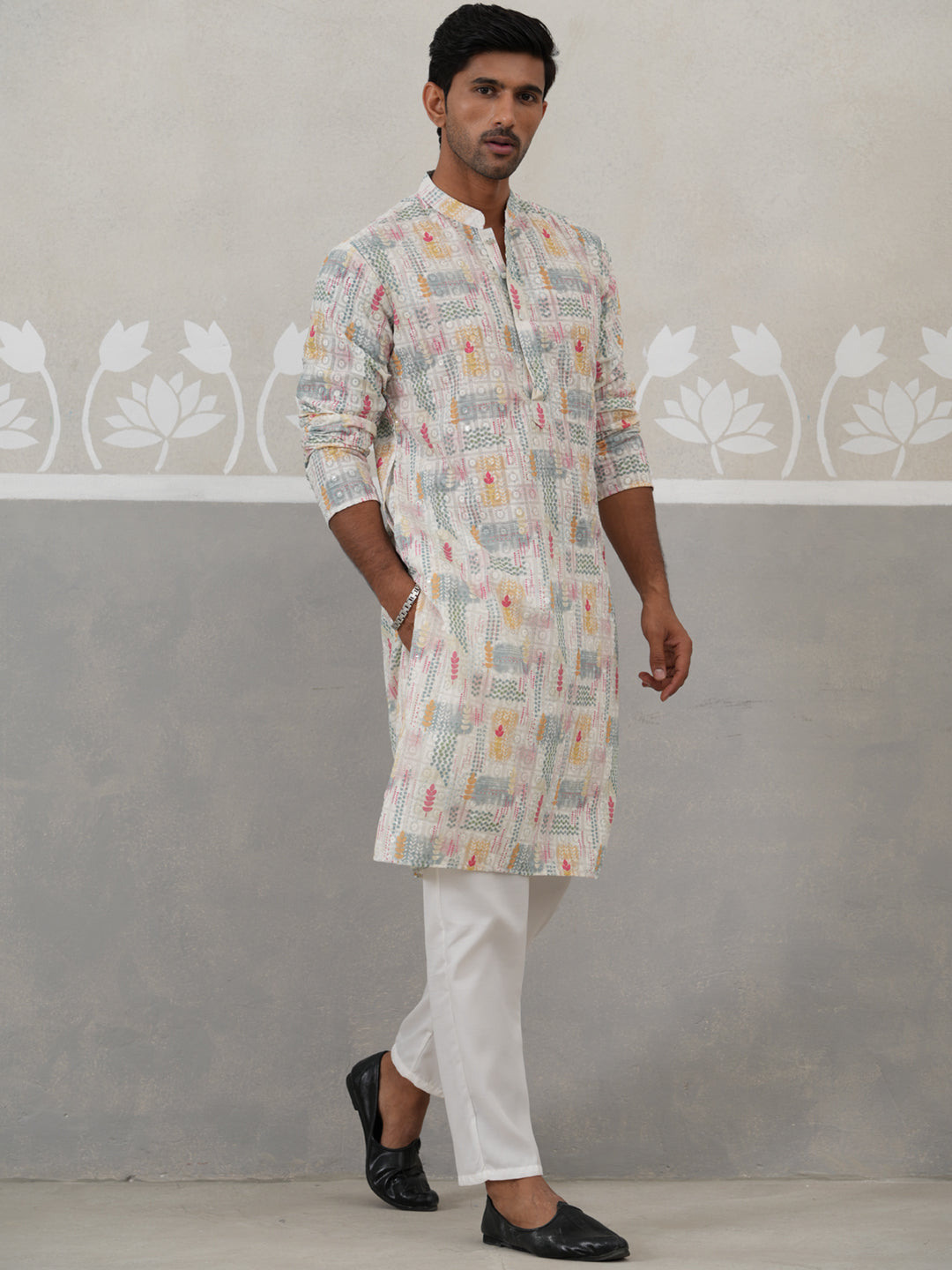 Printed And Embroidered Kurta Pyjama Set.