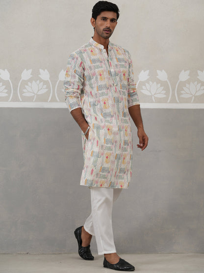 Printed And Embroidered Kurta Pyjama Set.