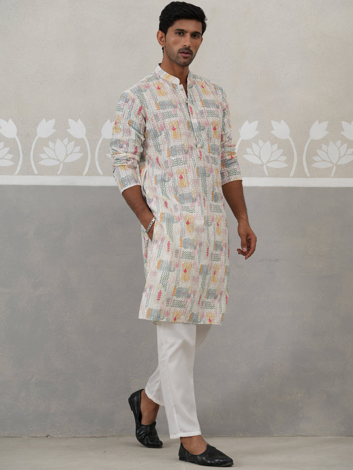 Printed And Embroidered Kurta Pyjama Set.