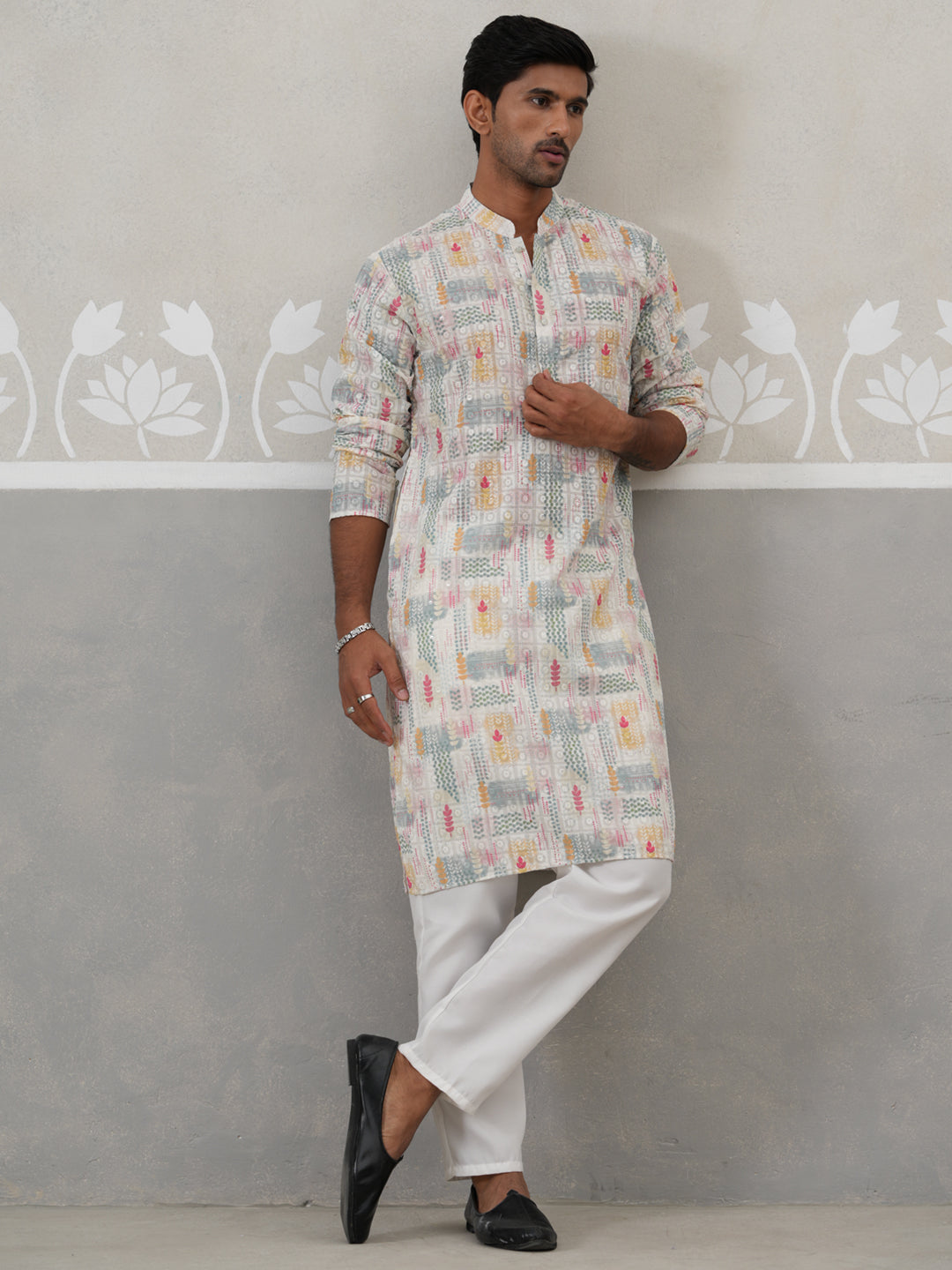 Printed And Embroidered Kurta Pyjama Set.