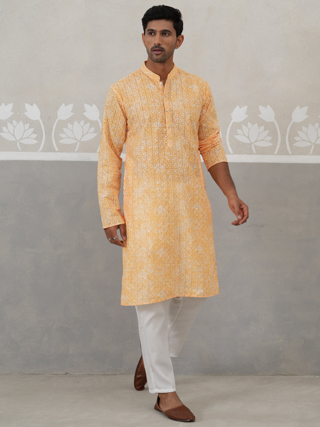Printed And Embroidered Kurta Pyjama Set.